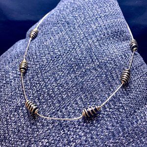 Gold Tone Swirl Pendants Necklace